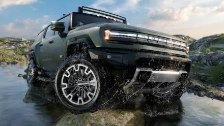 GMC Hummer EV Pickup Edition 1 driving through water, HD wallpaper and background.
