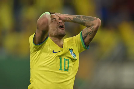 Neymar, wearing the Brazil National Football Team's yellow jersey, shows frustration during a match, capturing the intensity of soccer in this high-definition wallpaper.