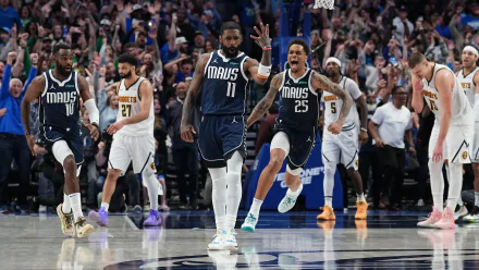 HD wallpaper featuring Kyrie Irving and the Dallas Mavericks in action during an NBA basketball game.
