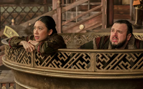 A scene from the TV show 3 Body Problem featuring characters, including John Bradley, peering over a decorative railing, set in a richly detailed environment. HD desktop wallpaper.