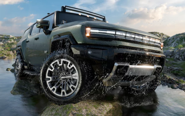 GMC Hummer EV Pickup Edition 1 driving through water, HD wallpaper and background.