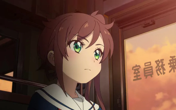 An anime character with green eyes and brown hair gazes thoughtfully from a train window, featured in Train to the End of the World. A captivating HD desktop wallpaper.