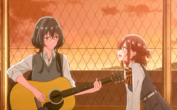 HD wallpaper of two anime characters from 'Whisper Me a Love Song' with one holding a guitar and the other speaking, both behind a fence with a warm, sunset-like glow.