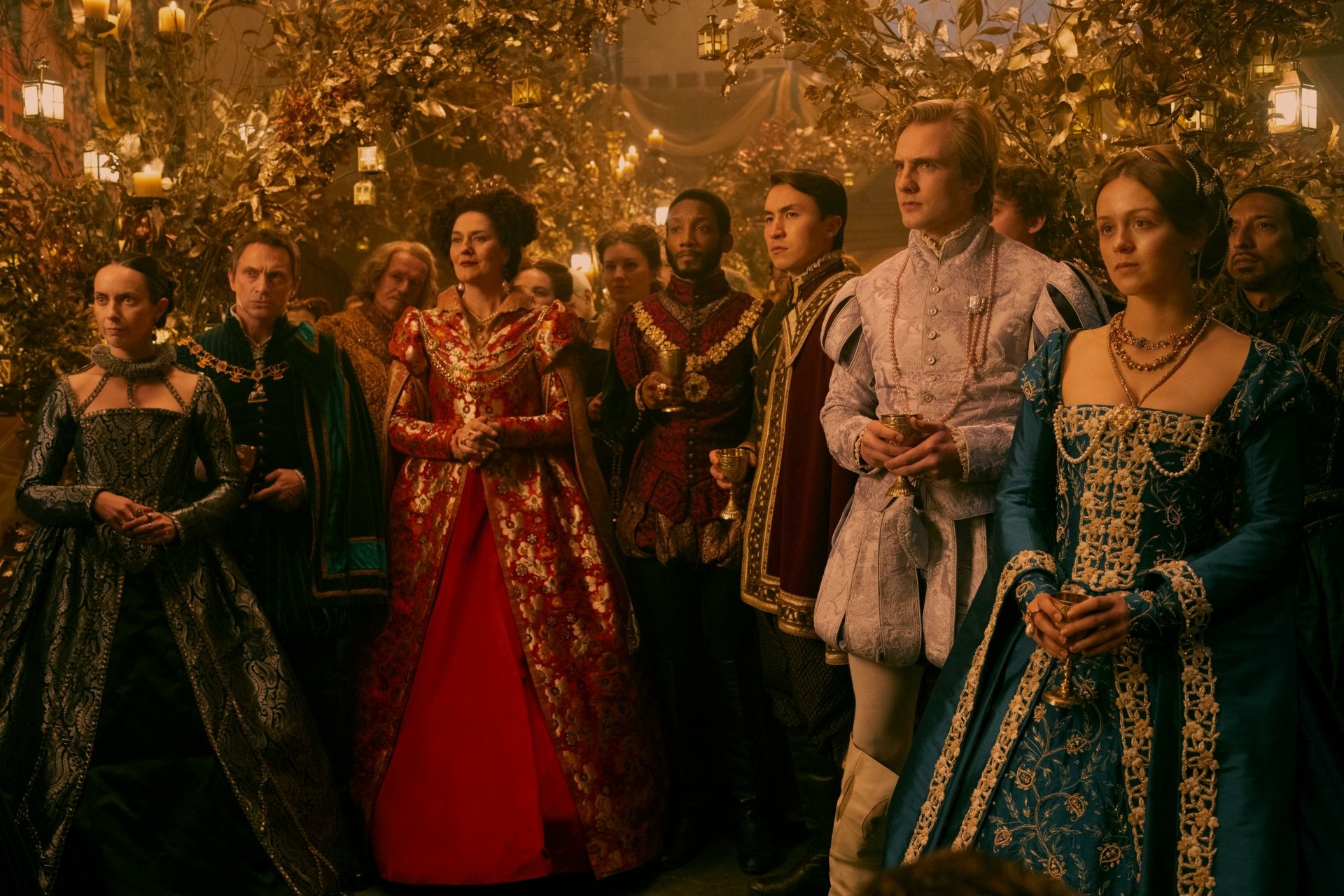 HD desktop wallpaper from the movie My Lady Jane featuring a group of characters in ornate, historical costumes at a lavish gathering.