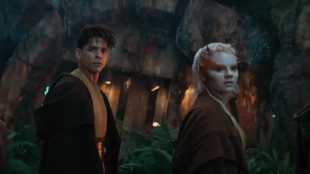 HD desktop wallpaper from The Acolyte (2024), featuring two characters in a forest-like setting with ambient lighting.