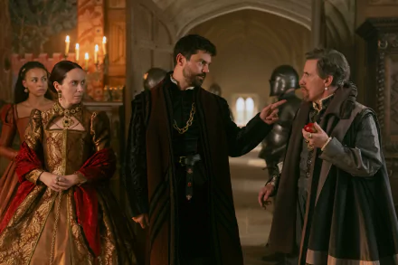 Scene from My Lady Jane showing characters in period costumes engaged in conversation, set in an opulent medieval hall. HDTV wallpaper and background.
