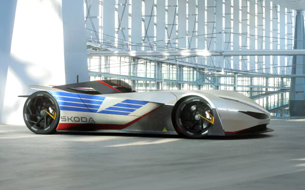 HD desktop wallpaper featuring the Skoda Vision GT concept car, displayed in a modern, glass-walled building.