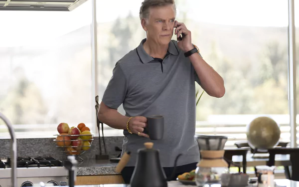 HD desktop wallpaper featuring Christopher McDonald in a kitchen scene from the TV show Hacks (2021).