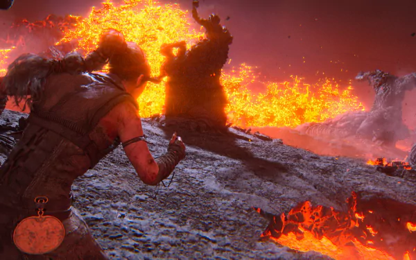 HD desktop wallpaper featuring a scene from Senua's Saga: Hellblade II, showcasing the protagonist facing a fiery, volcanic landscape with intense flames and molten lava.