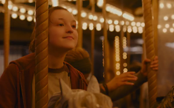 Wistful young girl on a carousel horse under warm, golden lights — cinematic moment from The Last Of Us, 8K Ultra HD PC desktop wallpaper and background.