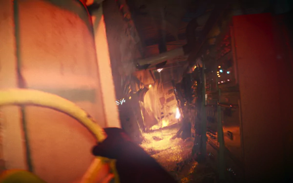 A high-definition desktop wallpaper featuring a thrilling scene from the video game Still Wakes the Deep, showcasing an intense moment with flames and shadows in a narrow, chaotic corridor.