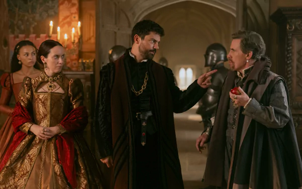 Scene from My Lady Jane showing characters in period costumes engaged in conversation, set in an opulent medieval hall. HDTV wallpaper and background.