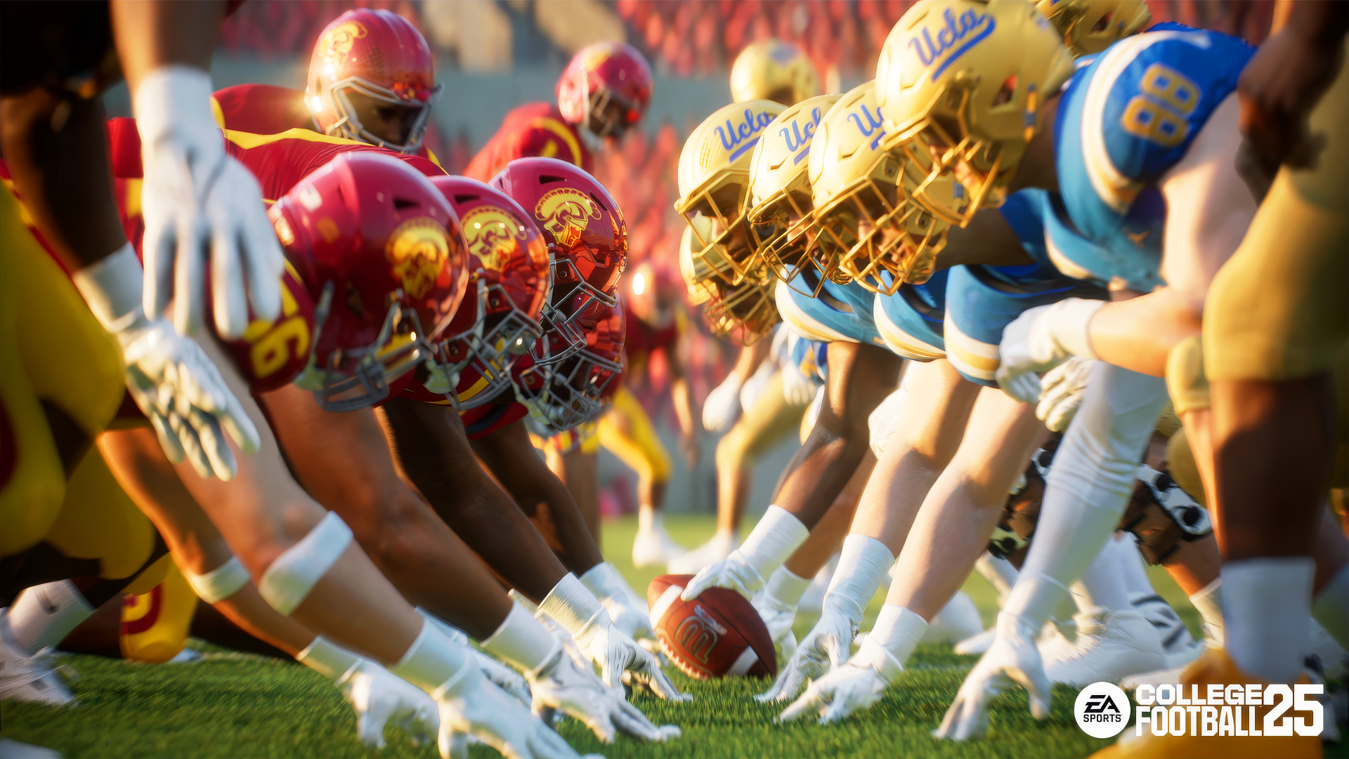 HD desktop wallpaper showing a tense moment in EA Sports College Football 25, with two football teams lined up face-to-face on the field, ready for action.