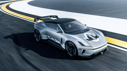 A sleek silver Polestar 6 sports car showcased on a racetrack, featuring a modern design and racing aesthetics, making it a striking HD desktop wallpaper.