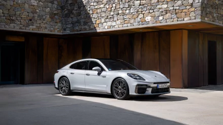 A sleek Porsche Panamera Turbo S E-Hybrid showcased as an HD desktop wallpaper, embodying luxury and high performance in a stunning vehicle design.