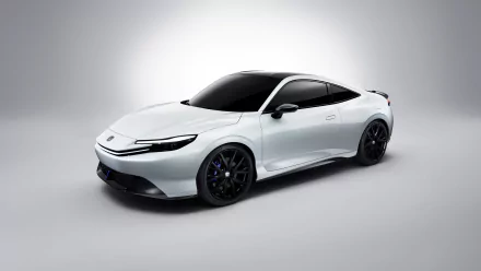 A sleek white Honda Prelude showcases its streamlined design against a minimalist background, making it a striking HD desktop wallpaper.