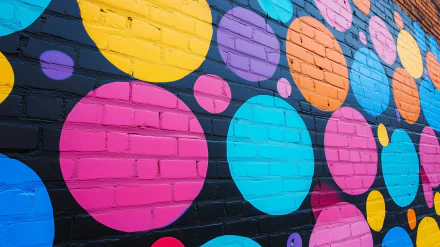 A vibrant HD desktop wallpaper featuring an artistic polka dot pattern, adding a playful touch to any background.