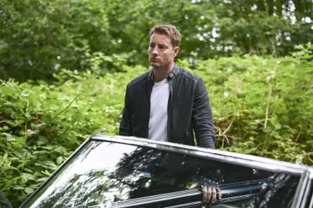 Justin Hartley appears in a serene, green setting, standing beside a car in this HD desktop wallpaper for the TV show Tracker (2024).