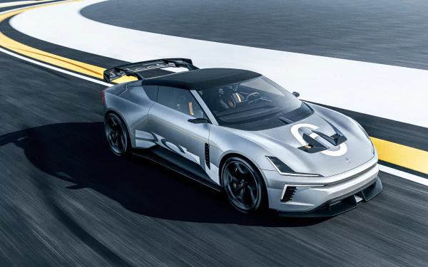 A sleek silver Polestar 6 sports car showcased on a racetrack, featuring a modern design and racing aesthetics, making it a striking HD desktop wallpaper.