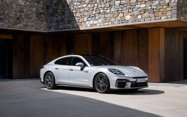 A sleek Porsche Panamera Turbo S E-Hybrid showcased as an HD desktop wallpaper, embodying luxury and high performance in a stunning vehicle design.