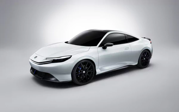 A sleek white Honda Prelude showcases its streamlined design against a minimalist background, making it a striking HD desktop wallpaper.