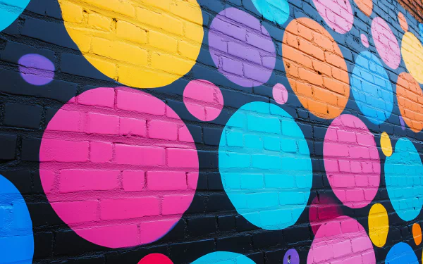 A vibrant HD desktop wallpaper featuring an artistic polka dot pattern, adding a playful touch to any background.