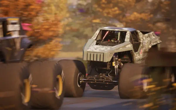 HD desktop wallpaper featuring vibrant graphics from the video game Monster Jam Showdown, showcasing thrilling monster truck action and excitement.