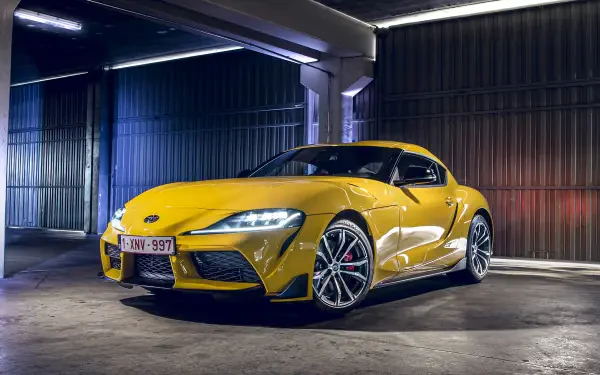 A sleek Toyota Supra showcased in a 4K Ultra HD desktop wallpaper, highlighting the car's dynamic design and performance appeal.