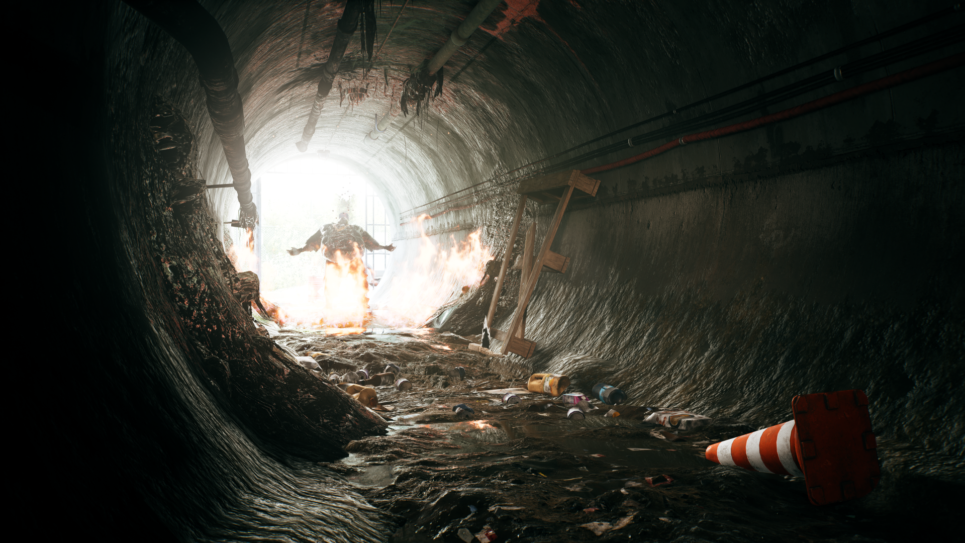 A striking 4K Ultra HD wallpaper from Dead Island 2, depicting a dark, gritty tunnel illuminated by a bright light, with debris and water creating a foreboding atmosphere.