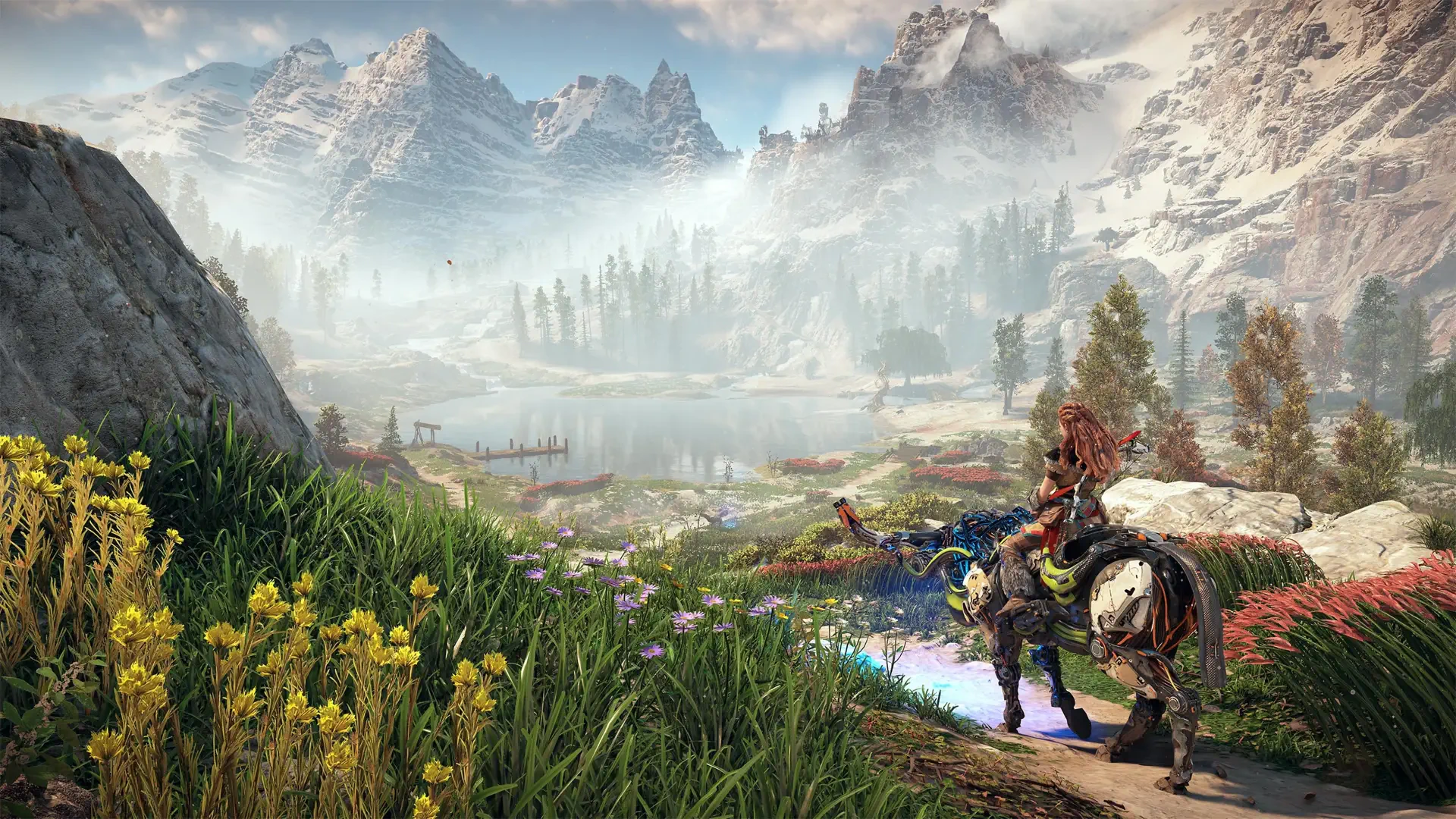 4K Ultra HD Horizon Zero Dawn PC desktop wallpaper showcasing a lush valley with wildflowers, a river, towering snowy mountains, and a character riding a horse.