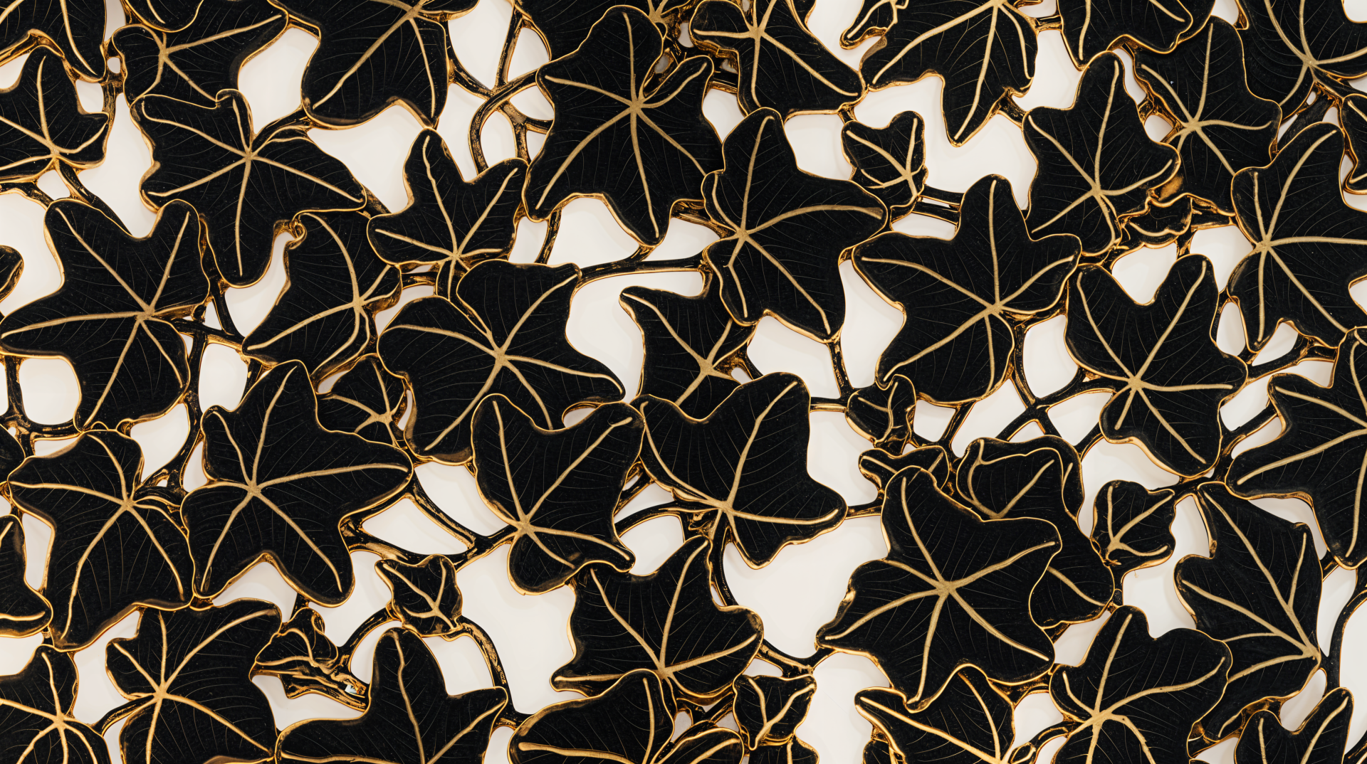 A stunning 4K Ultra HD desktop wallpaper featuring intricate patterns of ivy leaves with delicate gold outlines against a contrasting background.