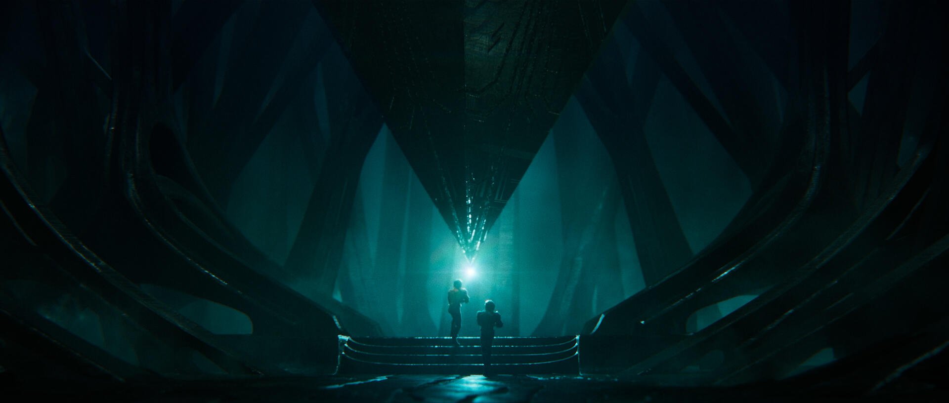 A captivating HD wallpaper from the video game Exodus (2024), depicting dark, atmospheric surroundings with figures illuminated by a mysterious blue light.