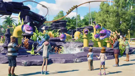 A vibrant scene from Planet Coaster 2 featuring colorful rides, playful creatures, and excited visitors, set against a backdrop of lush landscapes and a roller coaster.