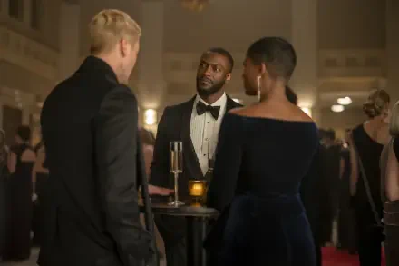 Aldis Hodge appears in a sophisticated scene from the TV show Cross (2024), engaging in conversation at a formal event surrounded by elegantly dressed attendees.