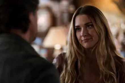A scene from the TV show Virgin River (2019) featuring Alexandra Breckenridge, capturing an intimate moment with an engaging expression, set in a cozy interior.