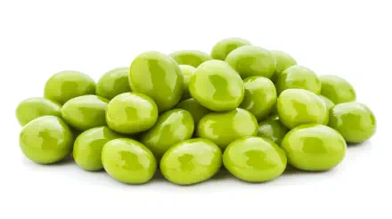 A vibrant pile of fresh edamame beans, showcasing their glossy green skins, set against a clean white background. This image serves as a stunning 4K Ultra HD desktop wallpaper.