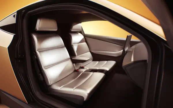 A sleek interior of a Tesla Cybercab, featuring luxurious leather seating and modern design elements, showcased in an 8K Ultra HD wallpaper.