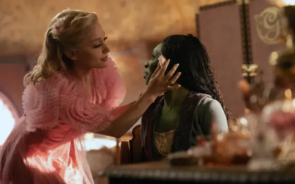 Ariana Grande and Cynthia Erivo in a scene from the movie Wicked, showcasing a vibrant moment between their characters, set in a beautifully designed interior.