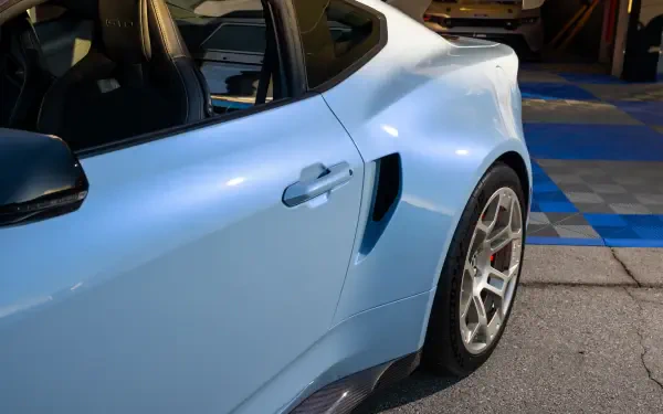 Close-up of a Ford Mustang GTD showcasing its sleek design and unique features. The image is an 8K Ultra HD PC wallpaper, offering stunning detail for car enthusiasts.