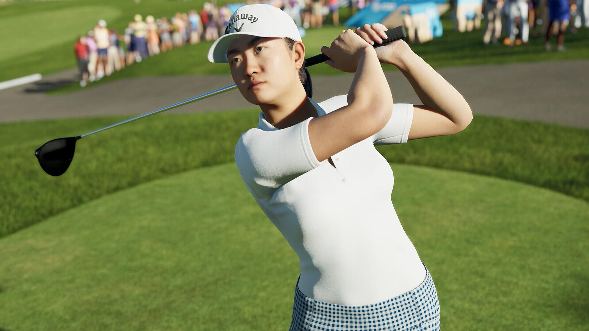 A golfer swings a club on the course in PGA TOUR 2K25, set against a vibrant backdrop of spectators enjoying the game. This high-definition image serves as an engaging desktop wallpaper.