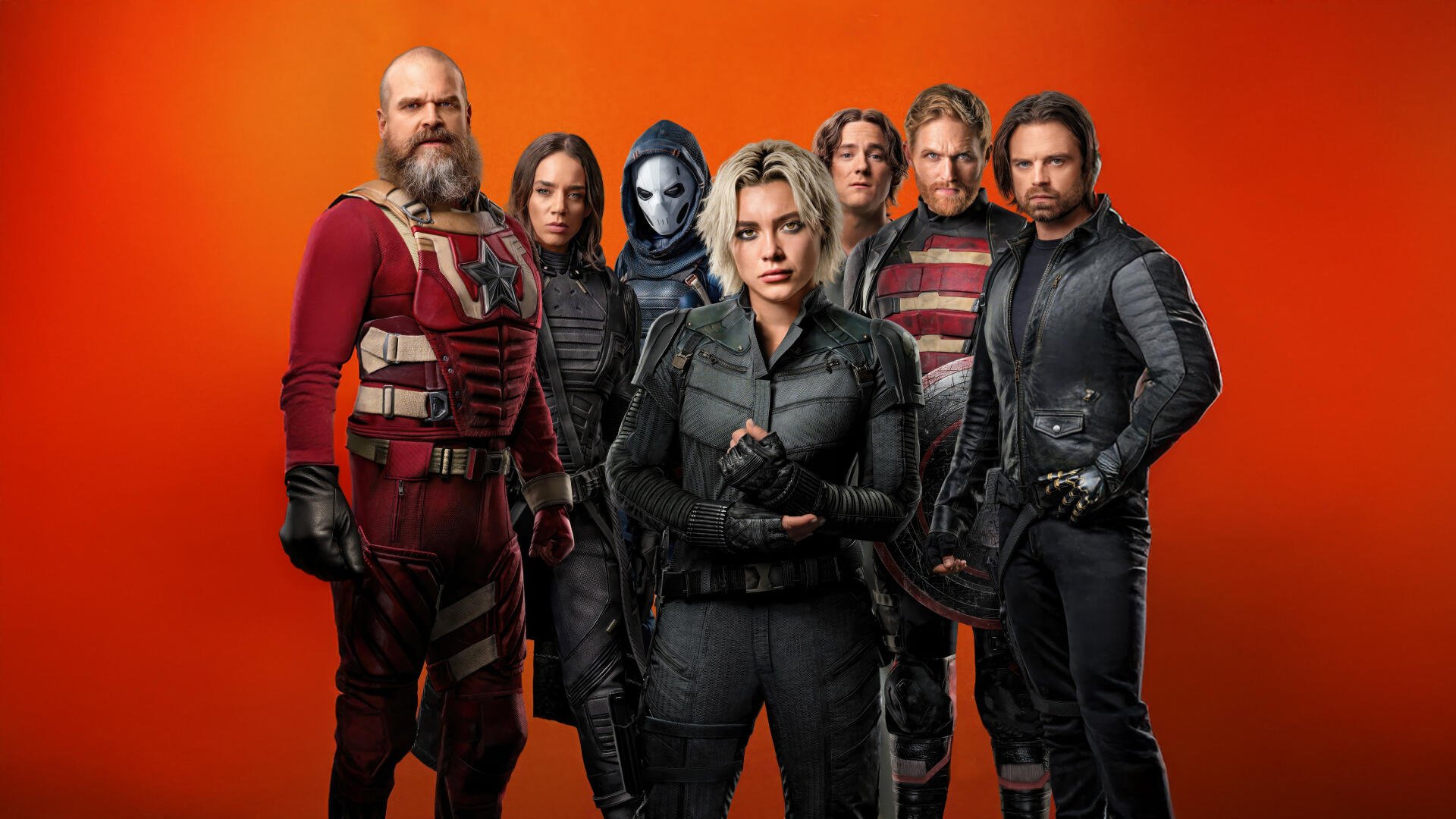 Thunderbolts* (2025) cast posed against a vivid orange background in this 4K Ultra HD PC desktop wallpaper and background.