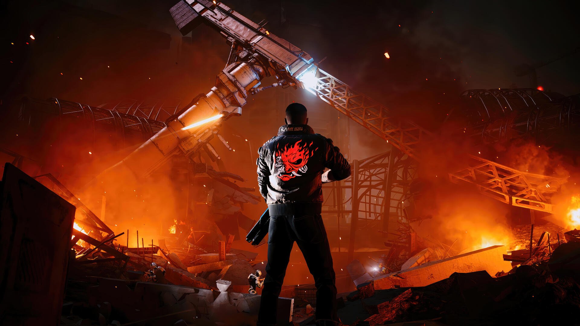 Cyberpunk 2077 4K Ultra HD PC desktop wallpaper/background: lone figure in a red skull jacket stands amid fiery industrial wreckage beneath a hovering craft.