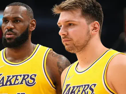 LeBron James and Luka Dončić in Los Angeles Lakers jerseys, focused and ready for action. A vibrant HD wallpaper capturing the energy of NBA sports.