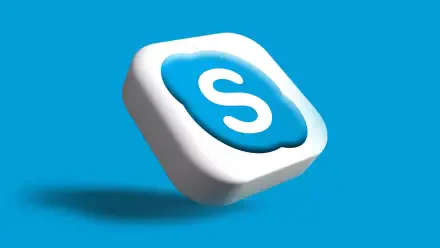 HD desktop wallpaper featuring the Skype logo, a white cloud-like icon with a blue 'S', set against a vibrant blue background, representing modern communication technology.