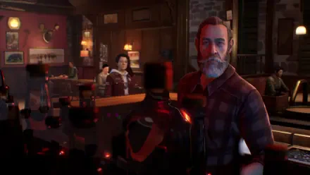 A scene from the video game Life Is Strange, featuring a character with a beard at a bar, surrounded by warm lighting and other patrons in a cozy atmosphere.