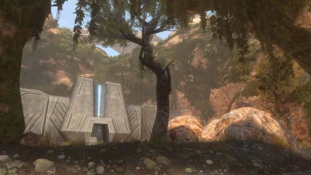 HD PC desktop wallpaper from Halo: Combat Evolved Anniversary featuring a scenic outdoor environment with trees, rocks, and a futuristic structure in the background.