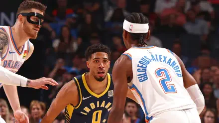Tyrese Haliburton of the Indiana Pacers in action during an NBA Finals basketball game, captured in an HD PC desktop wallpaper background.