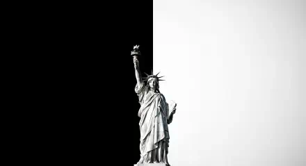 Statue of Liberty showcased in striking black and white contrast, presented as a 4K Ultra HD PC desktop wallpaper and background.