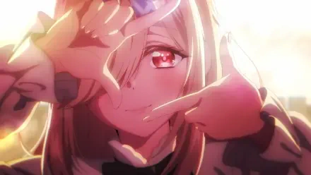 HD anime desktop wallpaper featuring Ai Mochizuki from A Couple of Cuckoos, showcasing a close-up with warm lighting and a playful hand gesture framing her face.