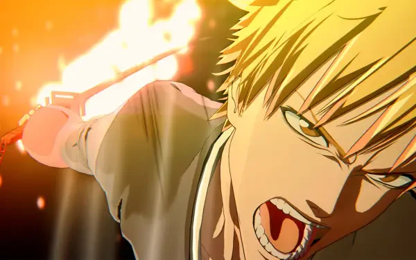 High-definition wallpaper featuring Ichigo Kurosaki from the video game Bleach: Rebirth of Souls, capturing an intense moment as he wields his sword amidst fiery effects.